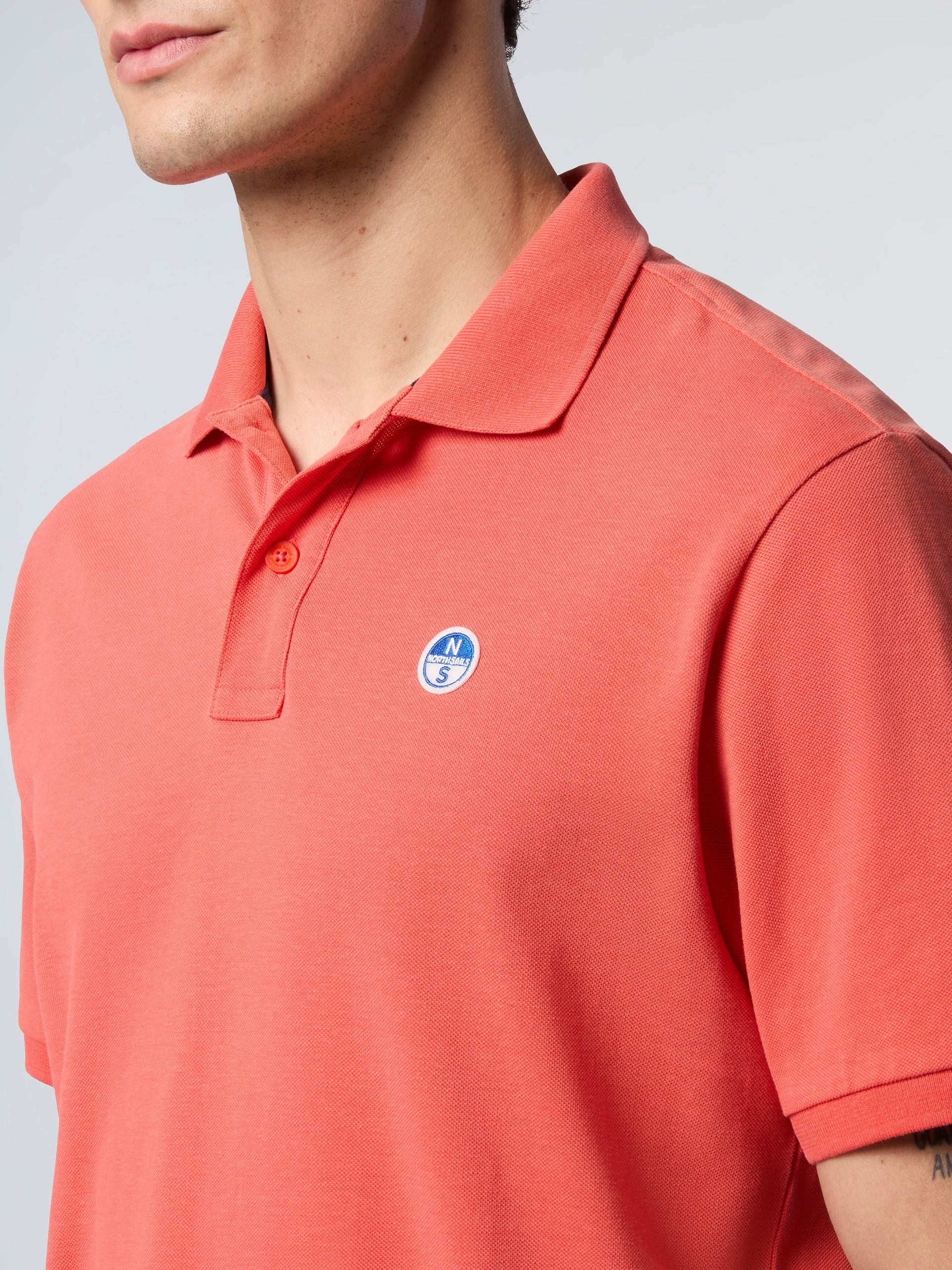 Polo shirt with logo patch