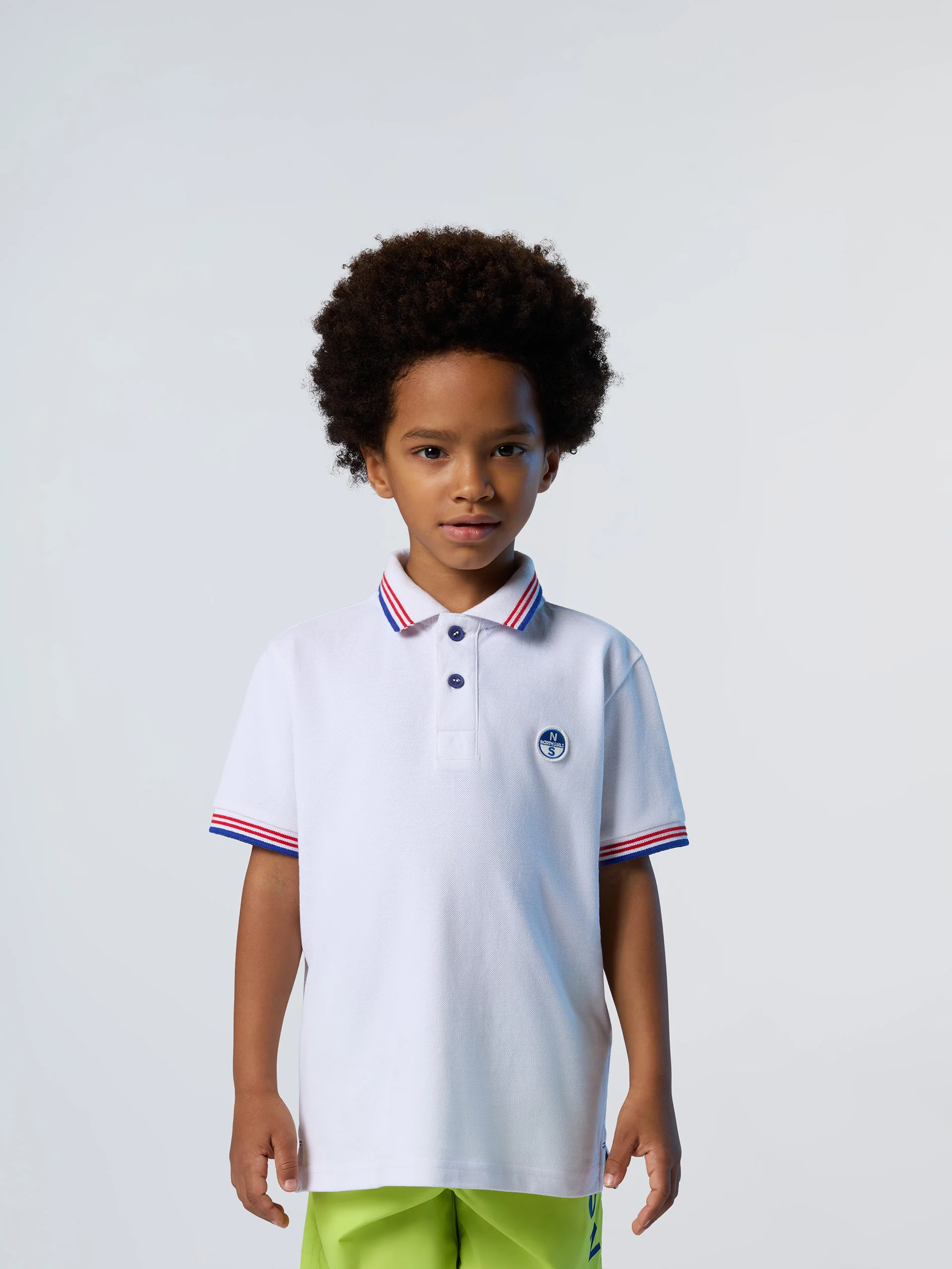Polo shirt with striped trims